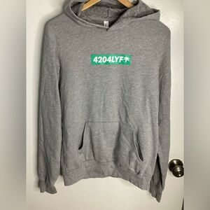 Bella Canvas Pull Over Gray Hoodie with Green Chest Logo 4204LYF M